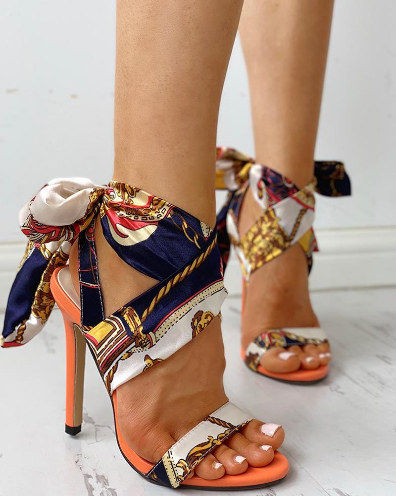 snakeskin platform heels